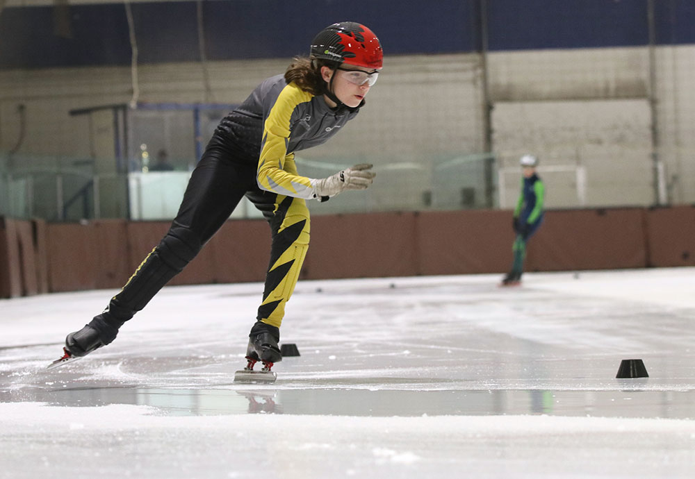 A youth speed skating in Brandon, Manitoba at the Westman Speed Skating Club